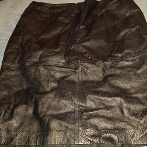 Genuine leather black mid length skirt